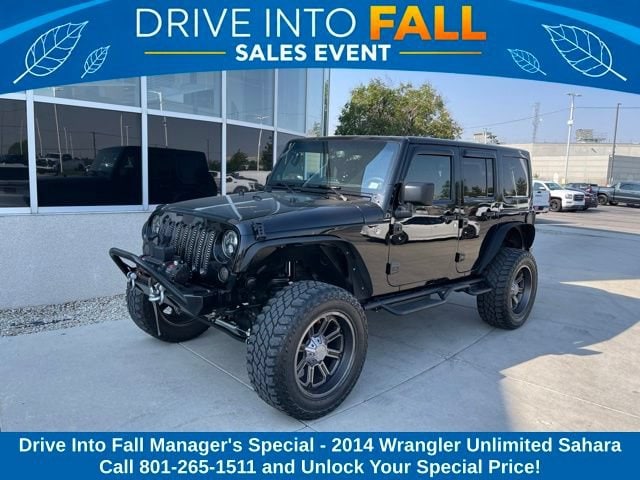 Used 2014 Jeep Wrangler Unlimited Sahara with VIN 1C4BJWEG1EL329259 for sale in South Salt Lake, UT