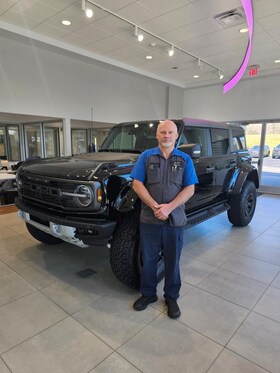 Staff member Tom Oelson from 7674a8dbfa48