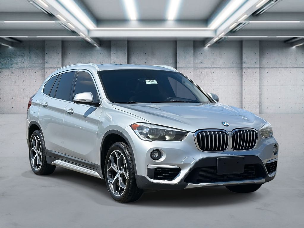 Used 2018 BMW X1 28i with VIN WBXHT3C39J5L34519 for sale in Saint James, NY