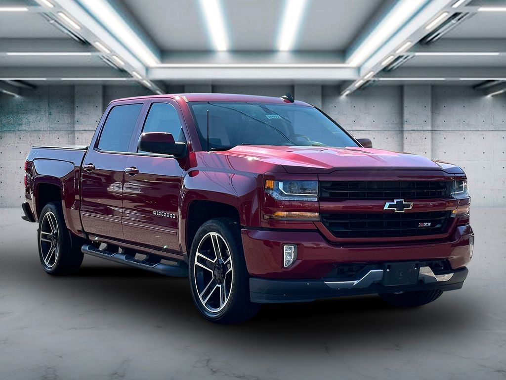 Used 2018 Chevrolet Silverado 1500 LT Z71 with VIN 3GCUKREC1JG343383 for sale in Saint James, NY