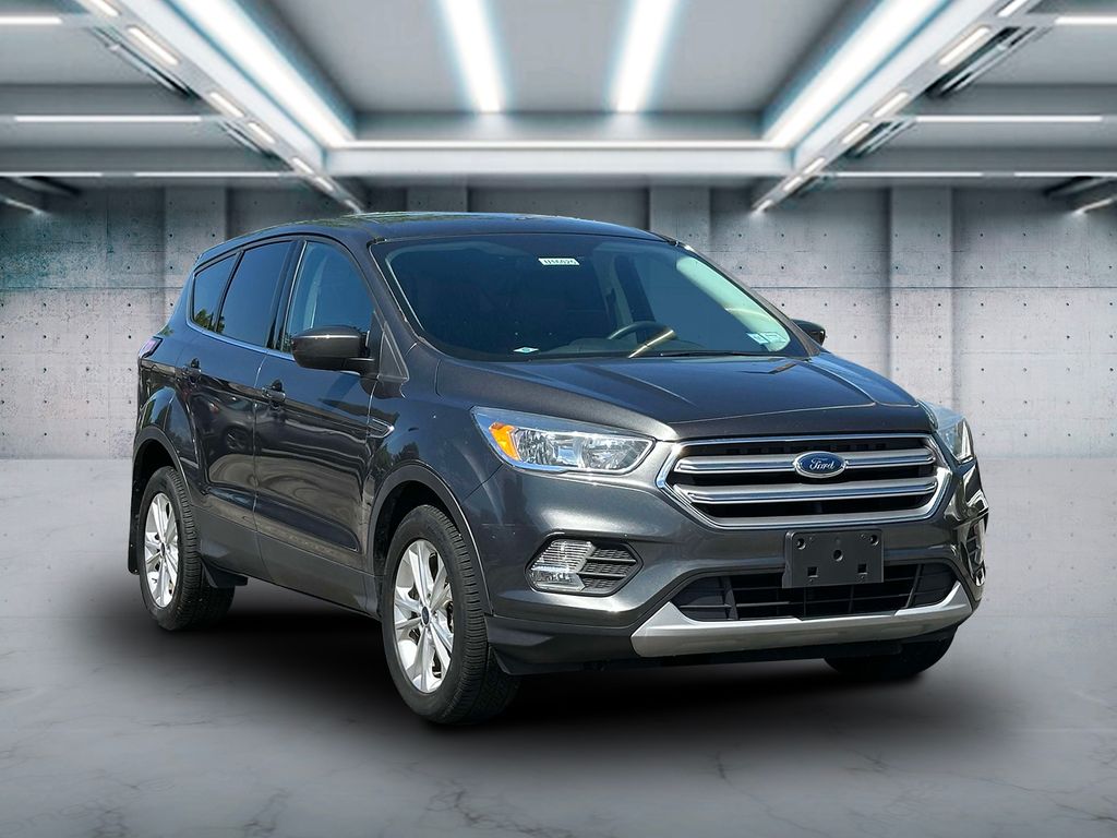 Used 2017 Ford Escape SE with VIN 1FMCU9GD8HUD71177 for sale in Saint James, NY