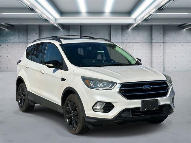 Used 2017 Ford Escape Titanium with VIN 1FMCU9JD8HUD02319 for sale in Saint James, NY
