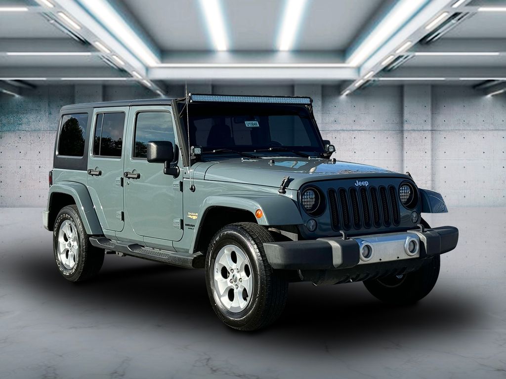 Used 2015 Jeep Wrangler Unlimited Sahara with VIN 1C4HJWEG1FL556415 for sale in Saint James, NY