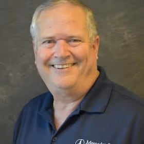 Staff member Jerry Reid from 9220bb418245