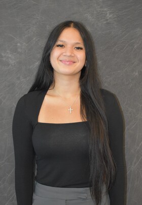 Staff member Trinaty Uli from 9220bb418245