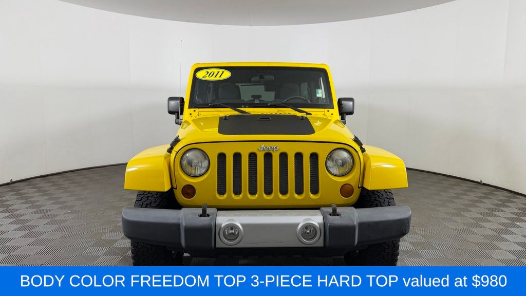 Used 2011 Jeep Wrangler Unlimited Sahara with VIN 1J4BA5H14BL553715 for sale in Midland, MI