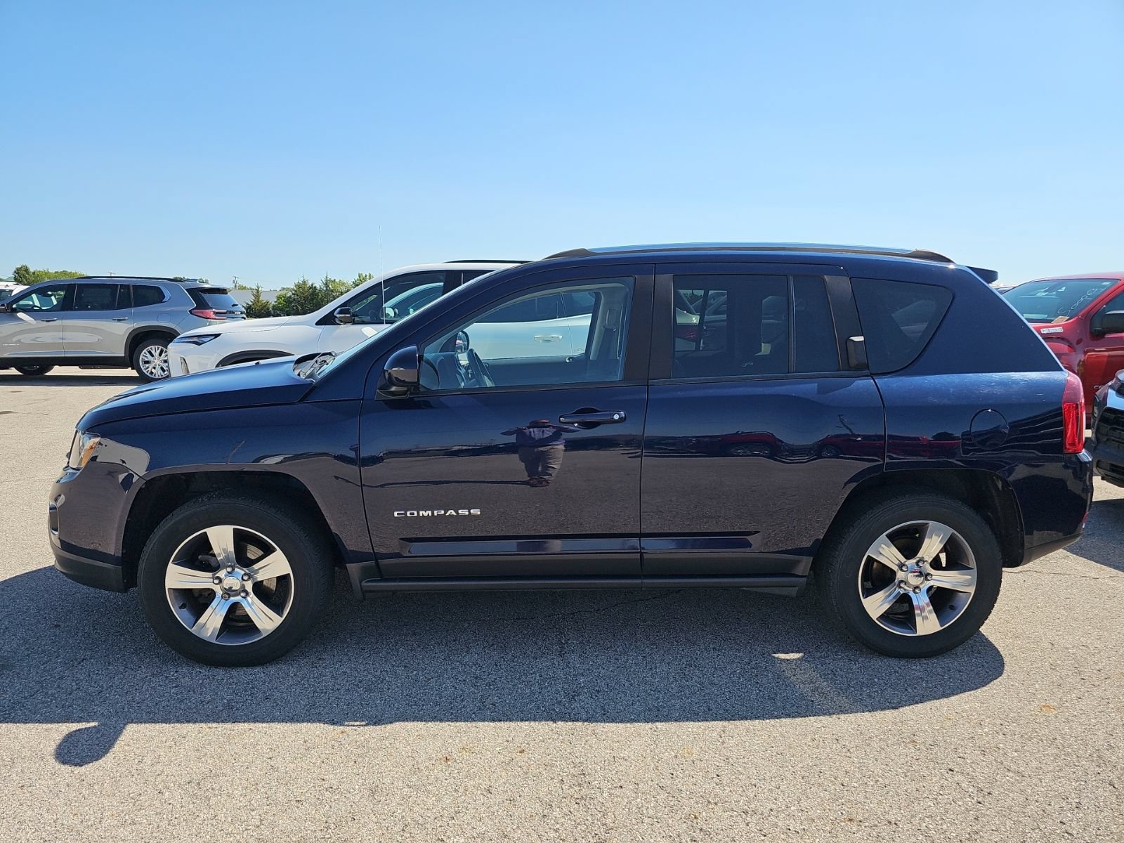 Used 2016 Jeep Compass High Altitude with VIN 1C4NJDEB6GD775605 for sale in Napoleon, OH