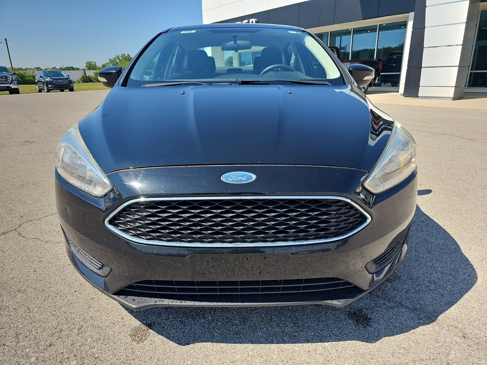 Used 2016 Ford Focus SE with VIN 1FADP3F26GL380760 for sale in Napoleon, OH