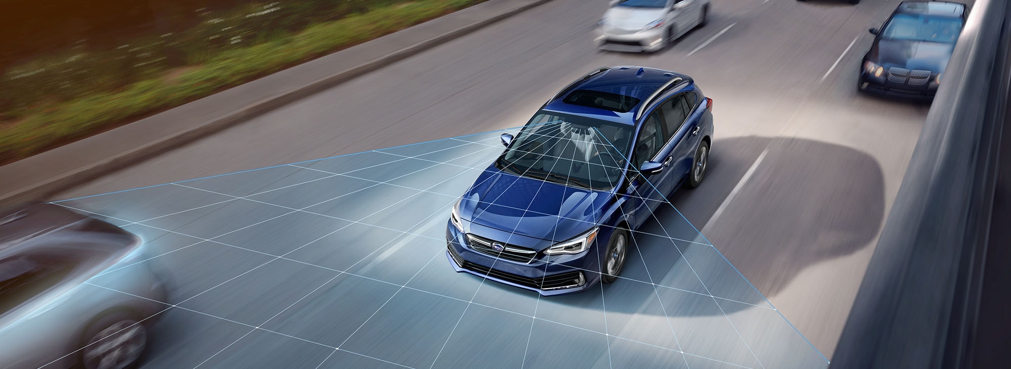  A photo illustration showing the EyeSight Driver Assist Technology on the 2023 Impreza hatchback.