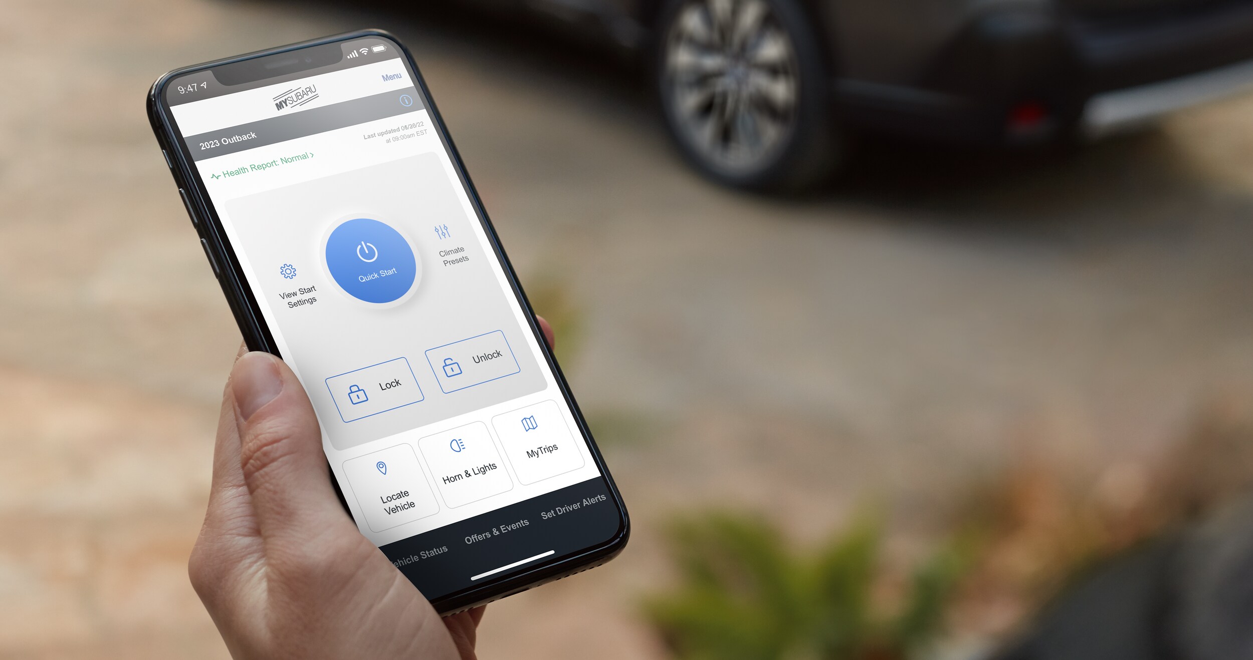 A close-up of the available Remote Engine Start with Climate Control feature of STARLINK Safety and Security on the 2023 Outback.