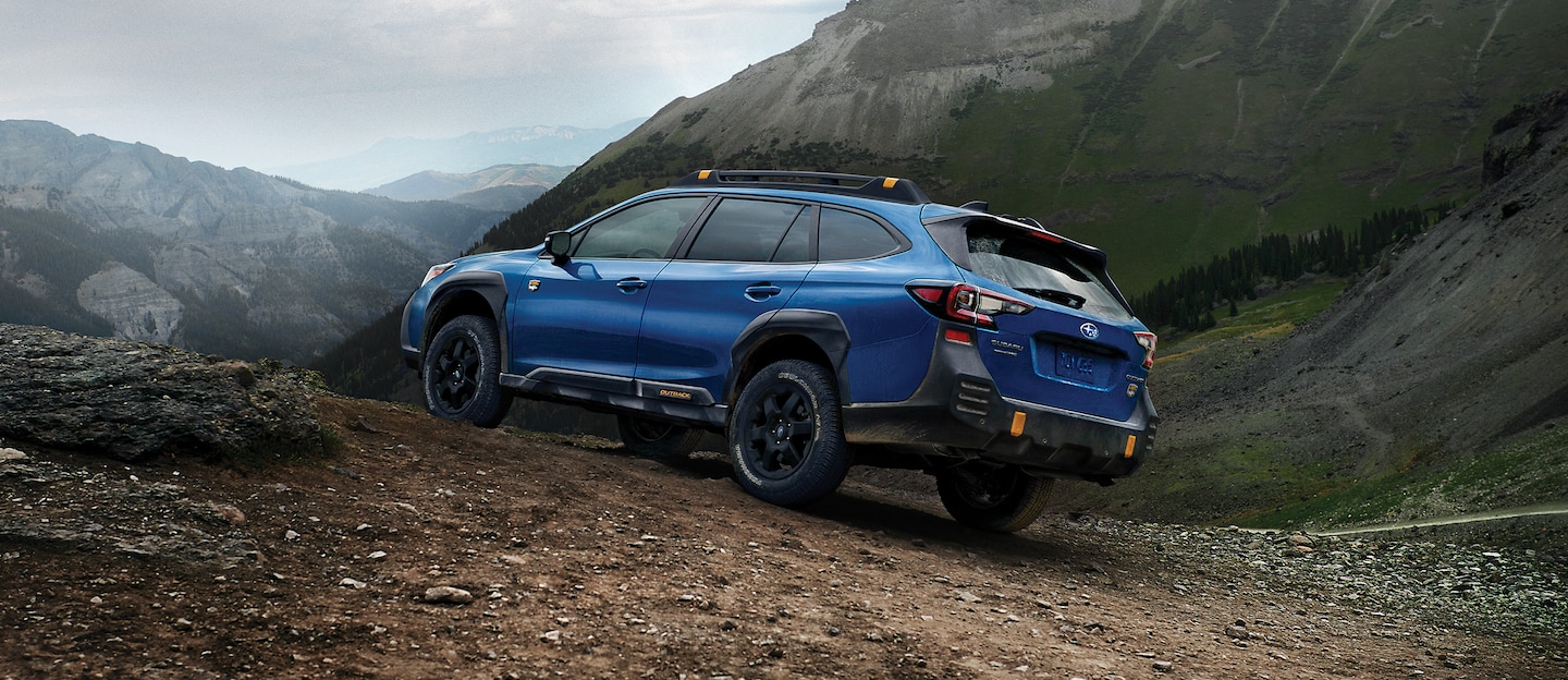 A 2023 Outback Wilderness parked in the mountains.