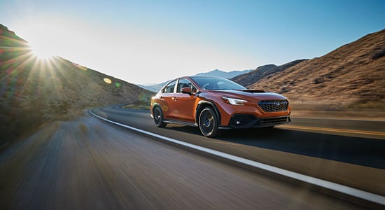 The Subaru WRX driving on a road