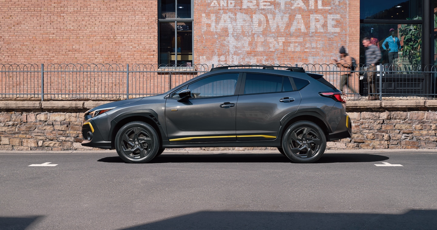 Left-facing grey 2026 Subaru Crosstrek Compact SUV.