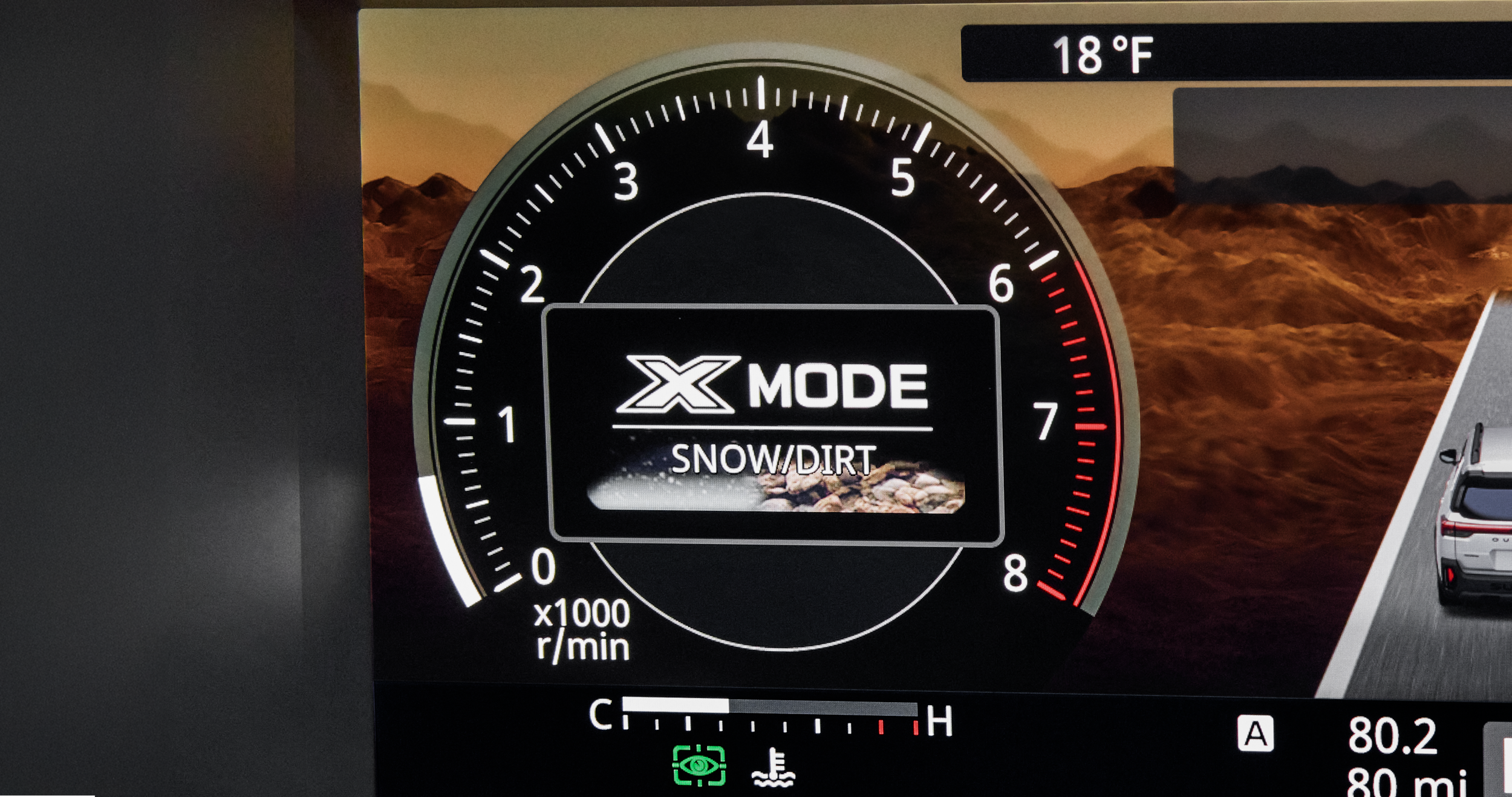  The X-MODE traction control settings in the digital dashboard display of a Subaru vehicle.