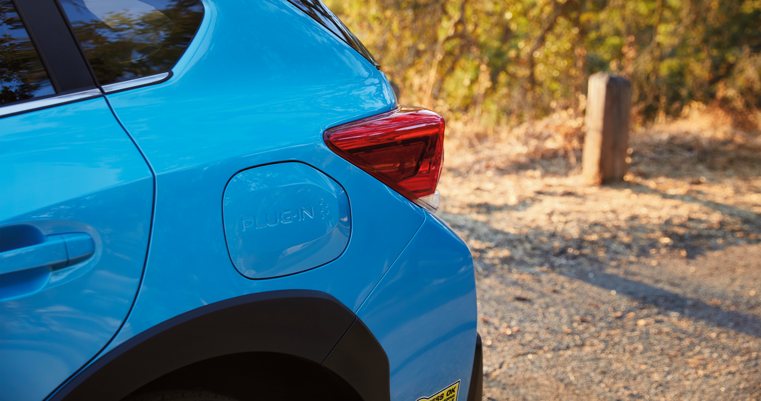 A close-up of the charging port of the 2023 Crosstrek Hybrid.