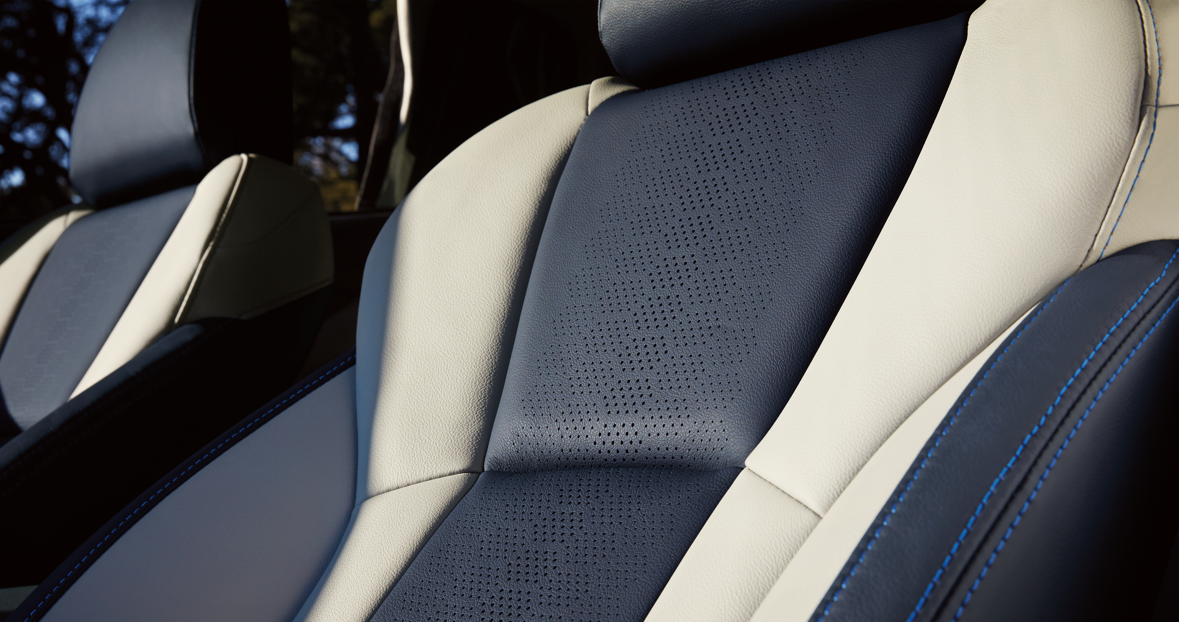  A close-up of the high-contrast navy and gray leather seats in the 2023 Crosstrek Hybrid.