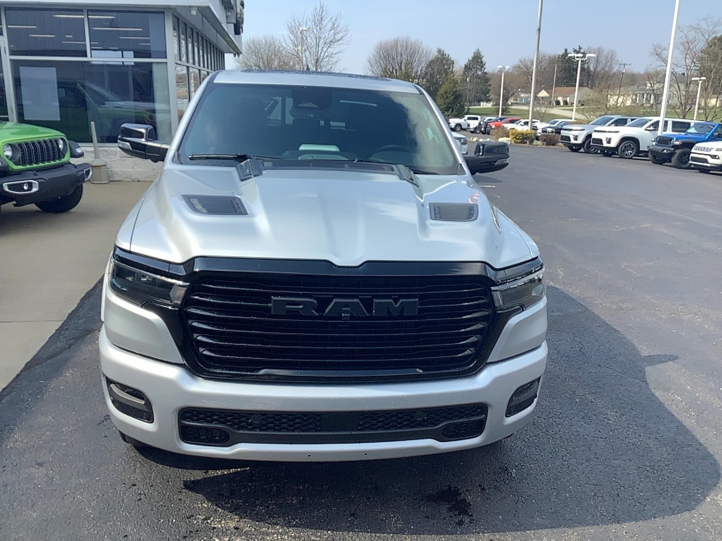 2026 Ram 1500 LARAMIE CREW CAB 4X4 5'7 BOX Silver Zynith at Solomon CJD Brownsville