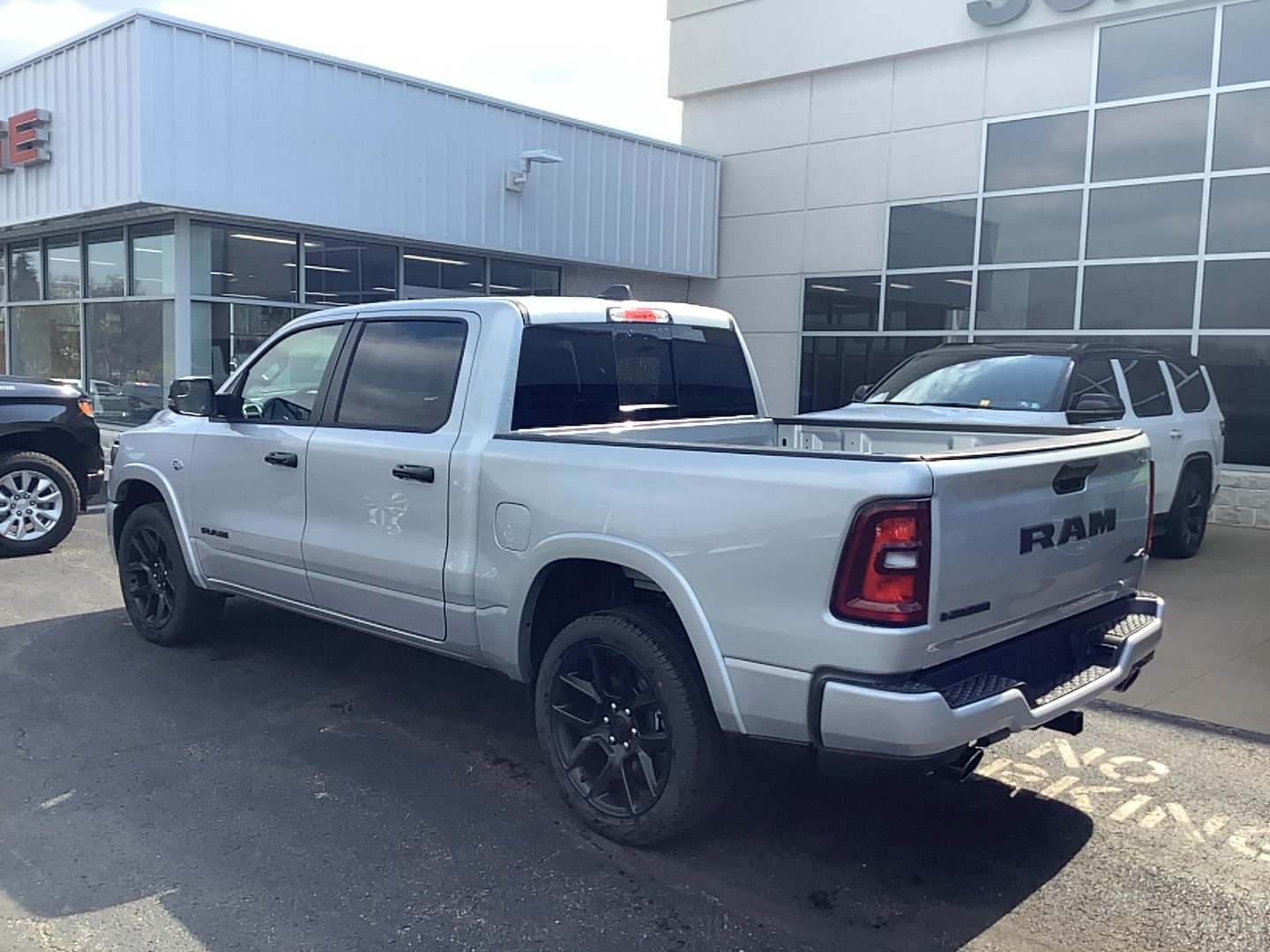 2026 Ram 1500 LARAMIE CREW CAB 4X4 5'7 BOX Silver Zynith at Solomon CJD Brownsville