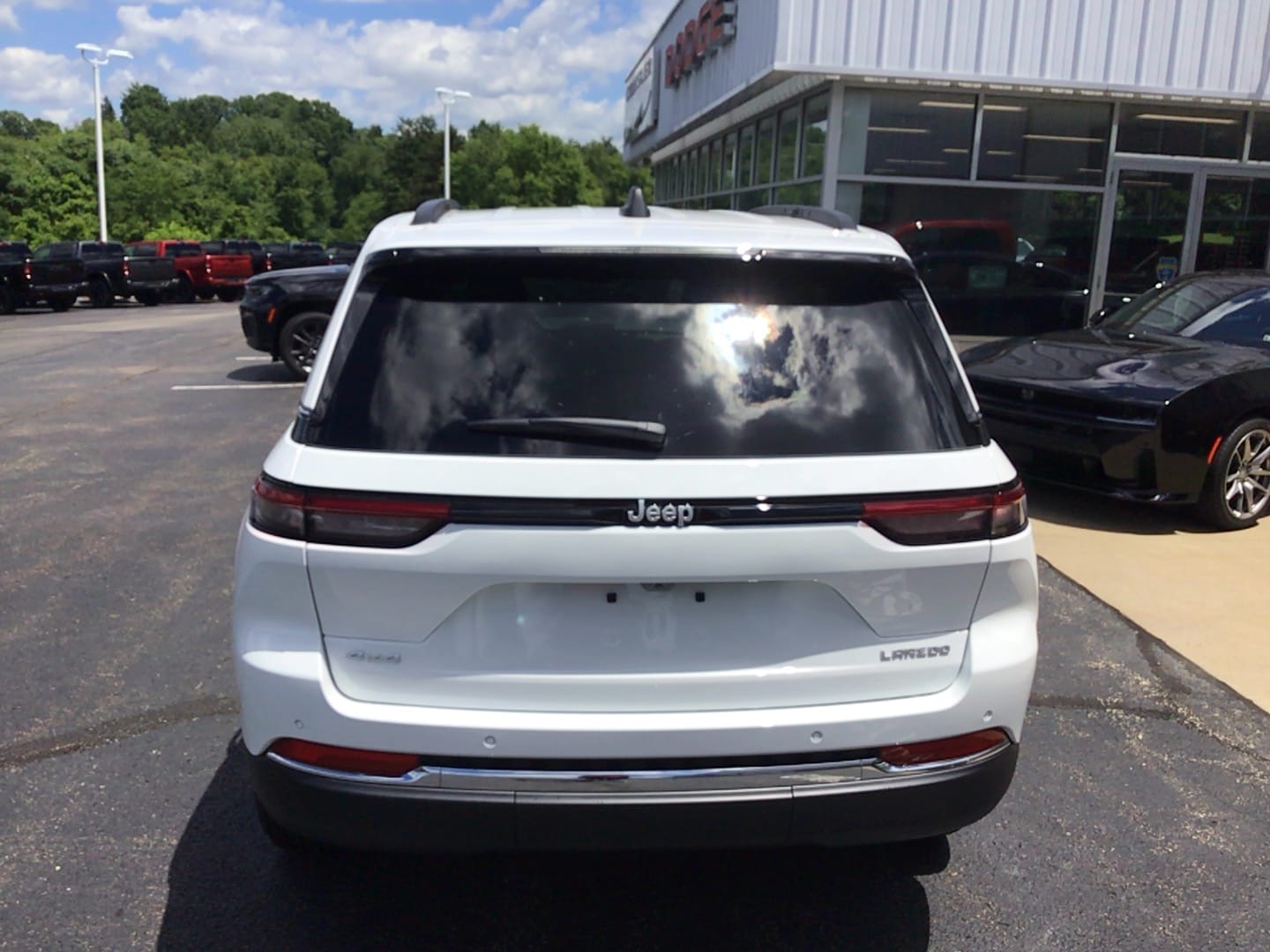 2026 Jeep Grand Cherokee LAREDO X 4X4 Bright White at Three Rivers CJD