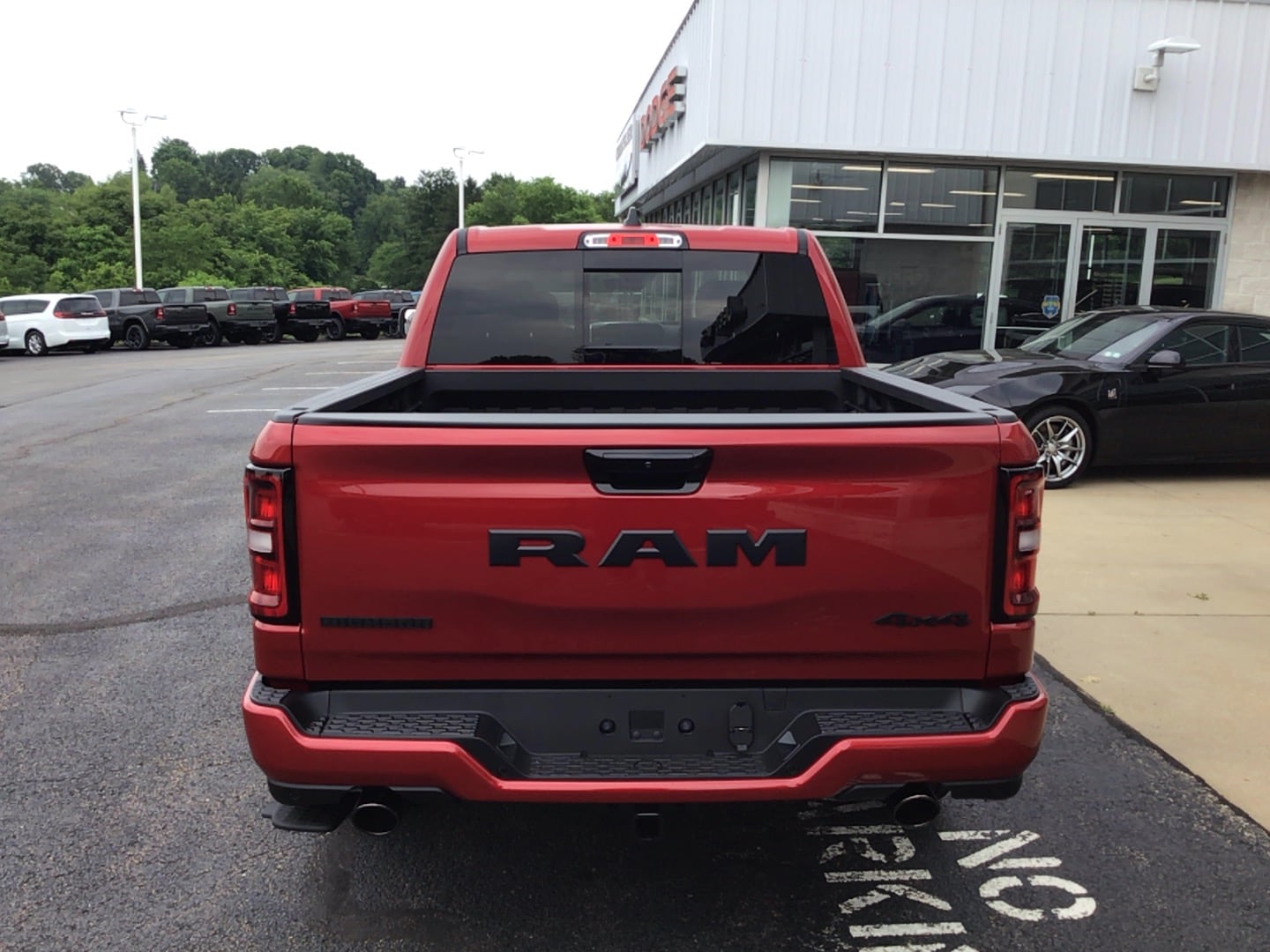 2026 Ram 1500 BIG HORN CREW CAB 4X4 5'7 BOX Molten Red Pearlcoat at Solomon CJD Carmichaels