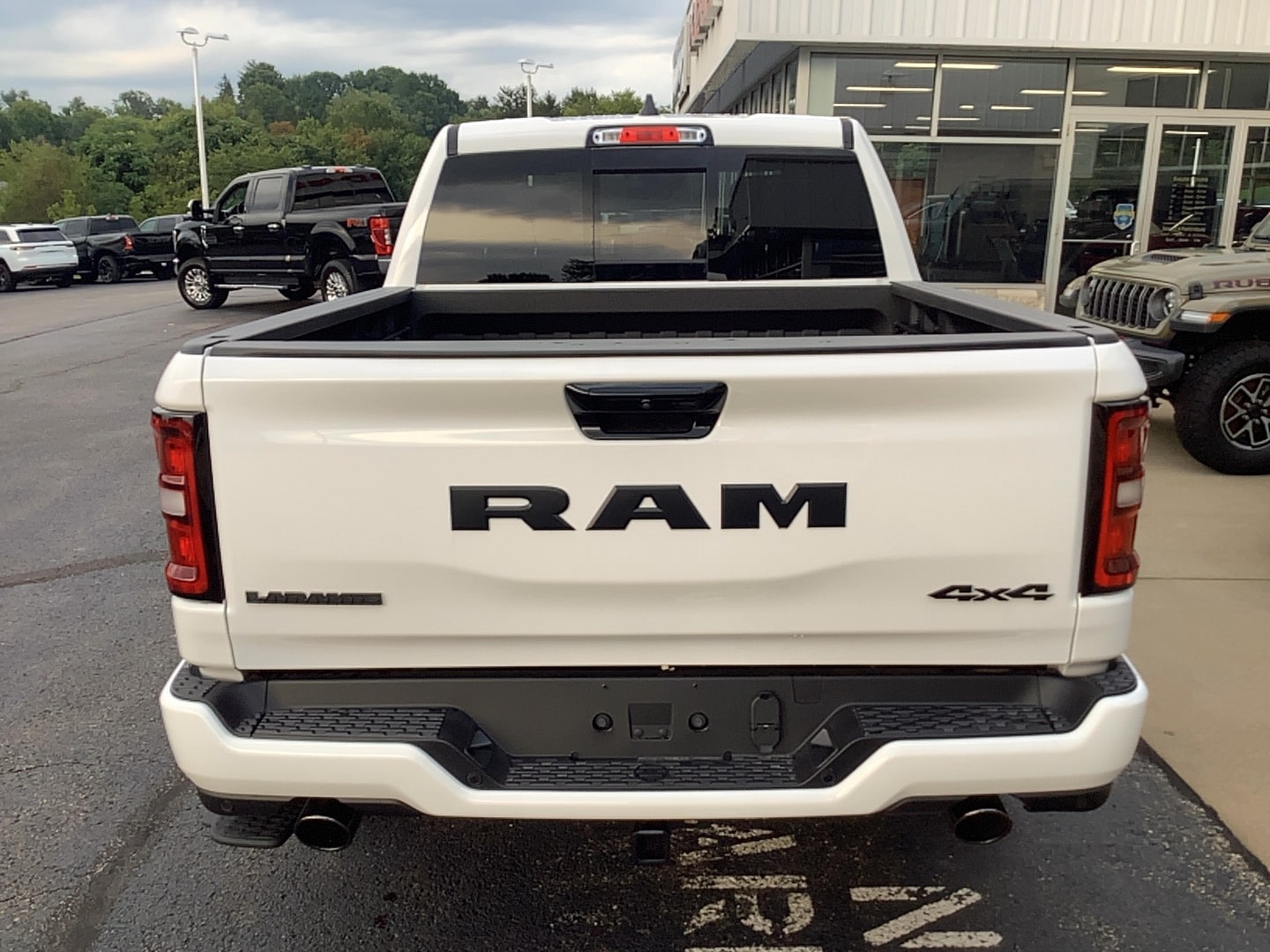 2026 Ram 1500 LARAMIE CREW CAB 4X4 5'7 BOX Bright White at Solomon CJD Brownsville