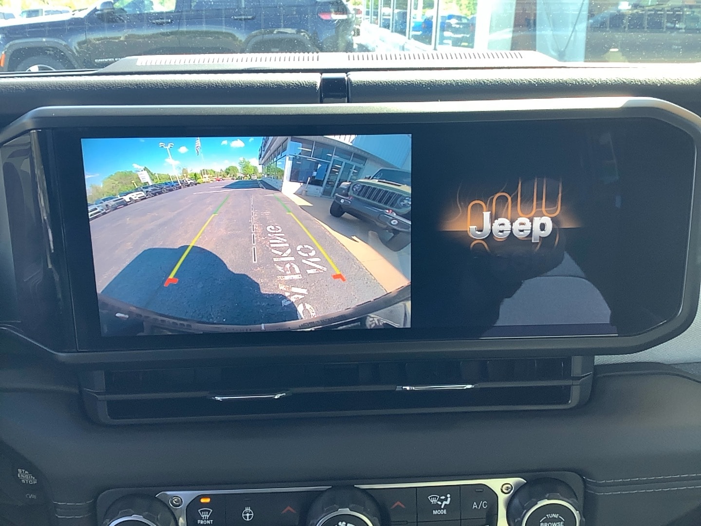 2025 Jeep Wrangler 4xe Sahara Bright White Clearcoat at Solomon CJD Brownsville