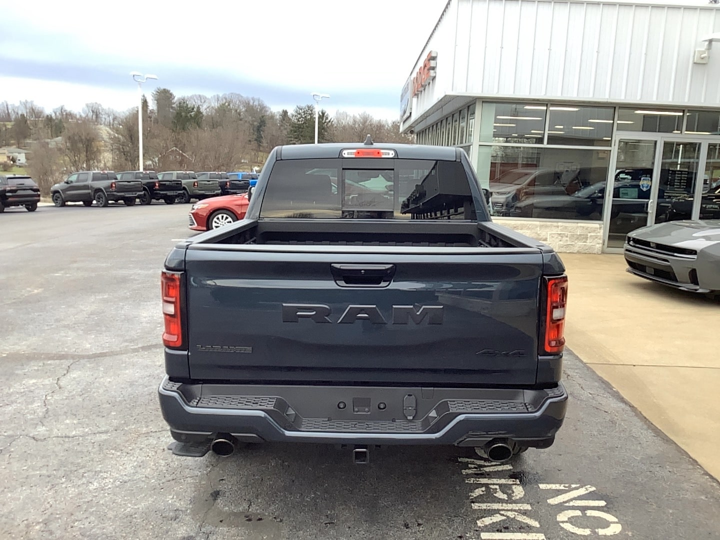 2026 Ram 1500 LARAMIE CREW CAB 4X4 5'7 BOX Forged Blue at Solomon CJD Carmichaels