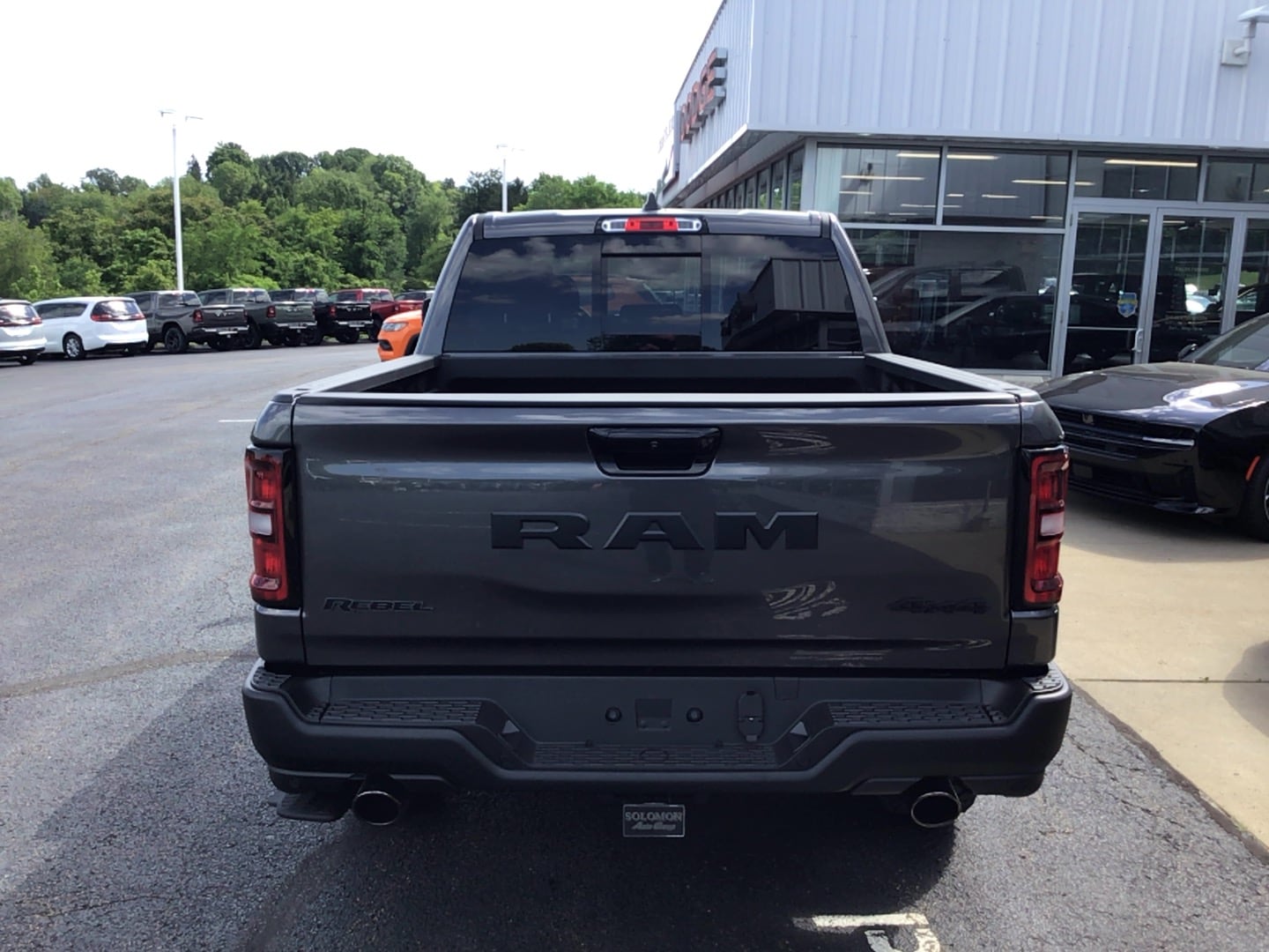 2026 Ram 1500 REBEL CREW CAB 4X4 5'7 BOX Granite Crystal at Solomon CJD Carmichaels