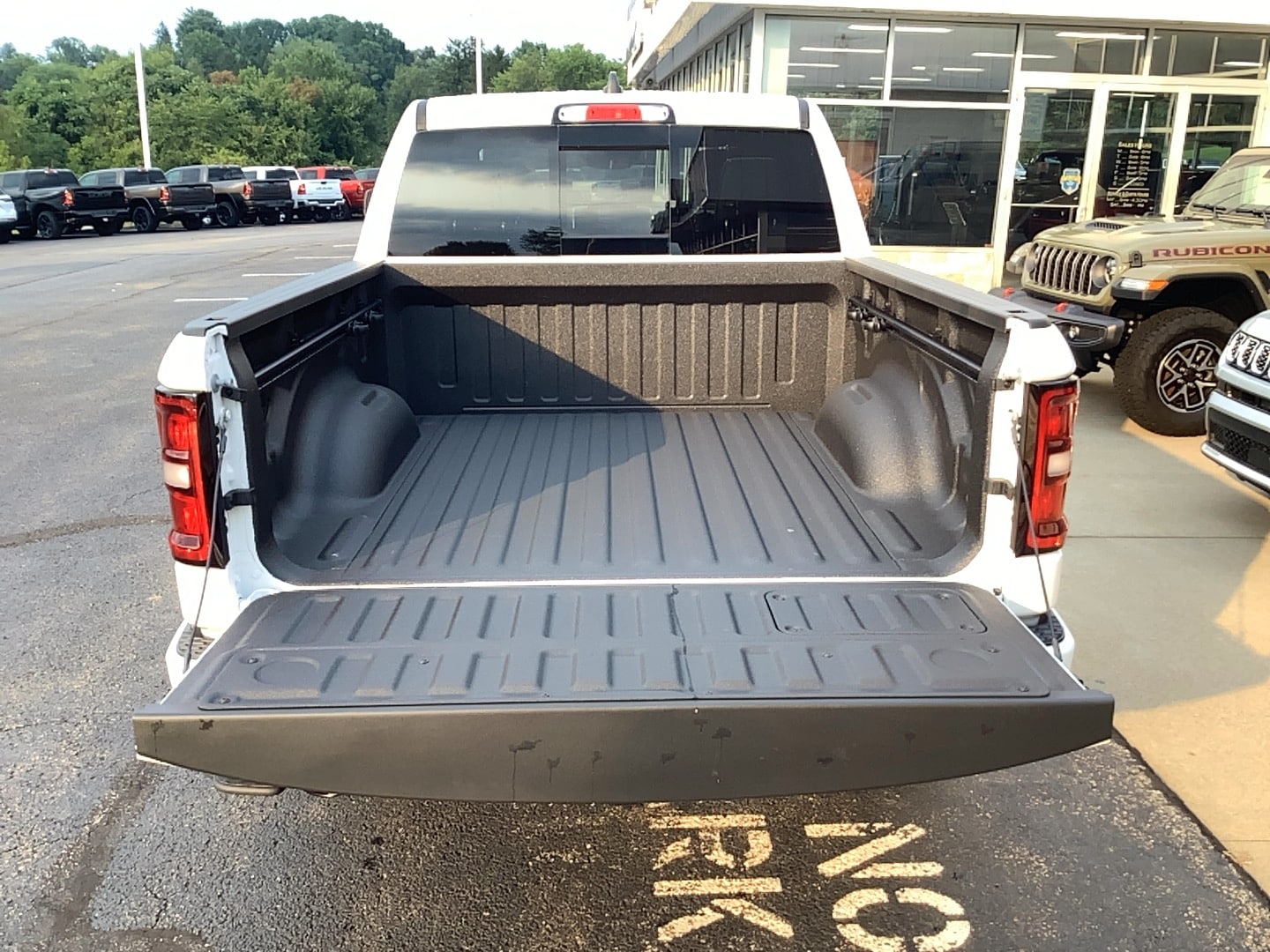 2026 Ram 1500 LARAMIE CREW CAB 4X4 5'7 BOX Bright White at Solomon CJD Brownsville