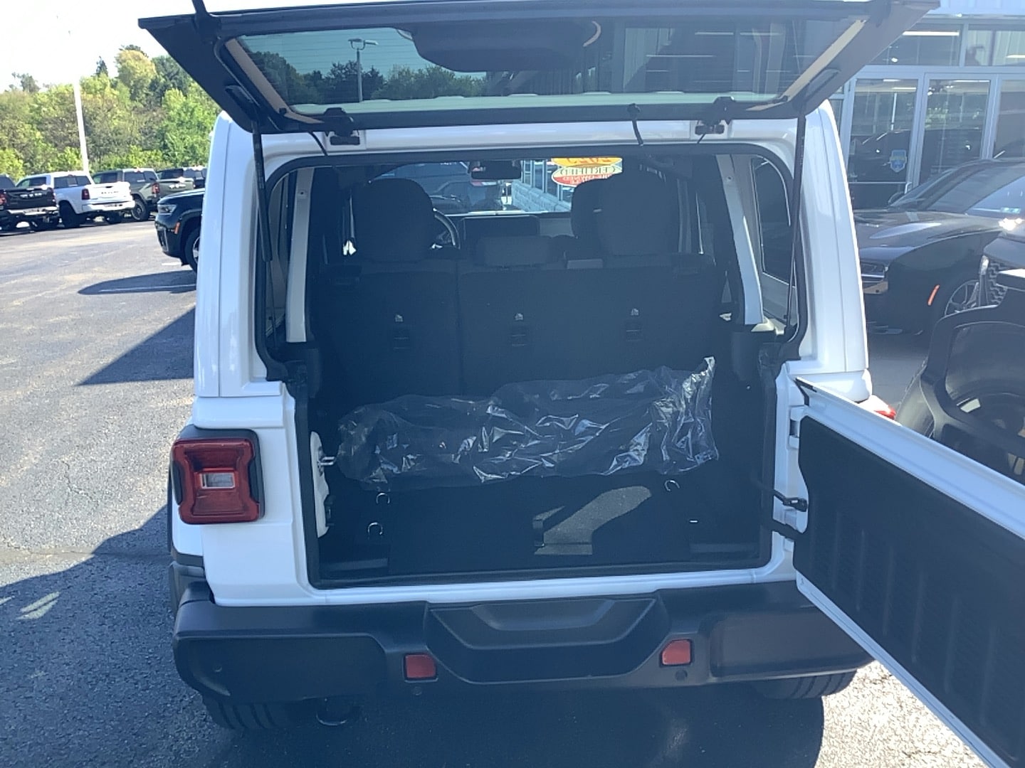 2025 Jeep Wrangler 4xe Sahara Bright White Clearcoat at Solomon CJD Brownsville