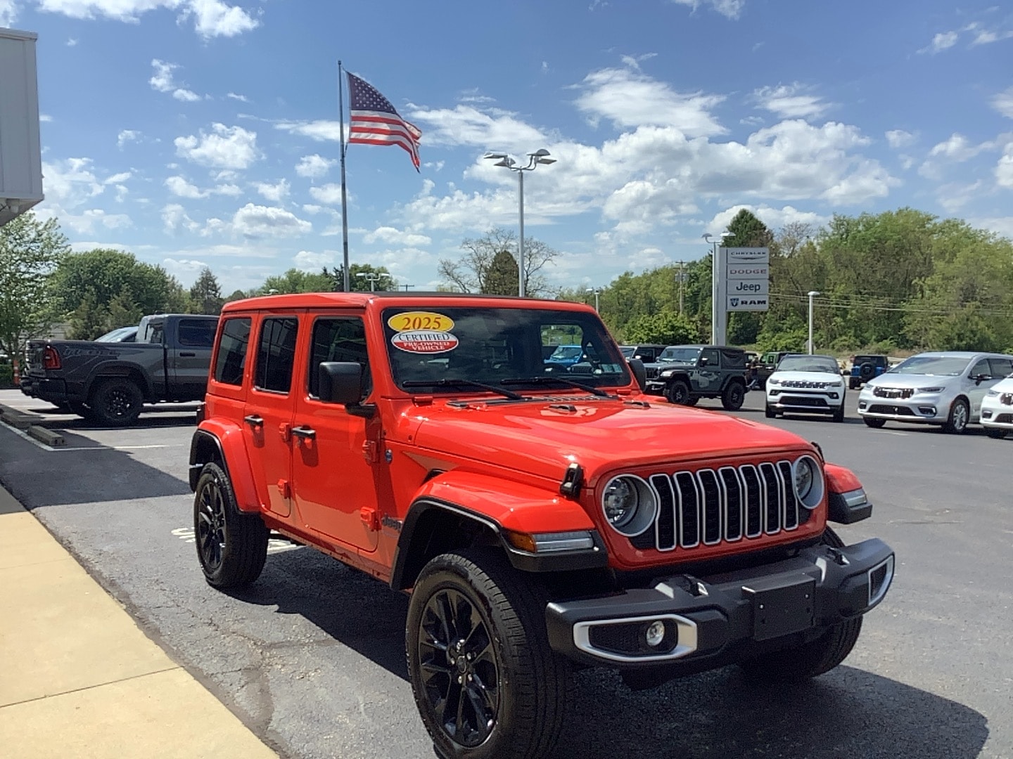 2025 Jeep Wrangler 4xe Sahara Firecracker Red Clearcoat at Solomon CJD Brownsville