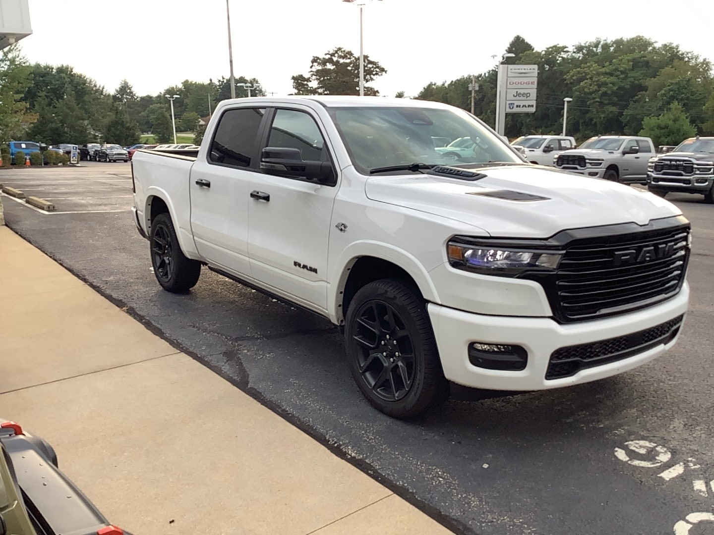 2026 Ram 1500 LARAMIE CREW CAB 4X4 5'7 BOX Bright White at Solomon CJD Brownsville