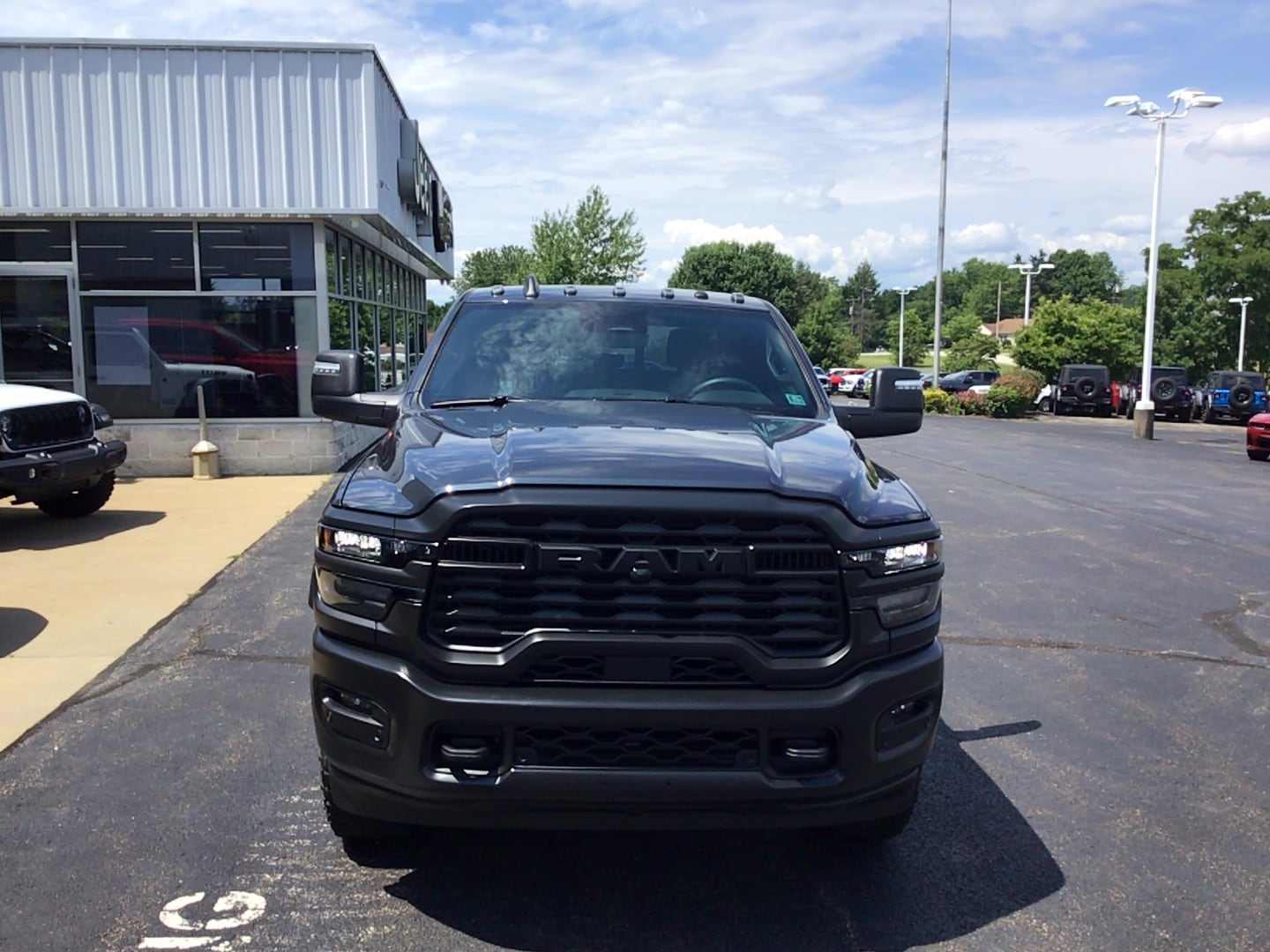 2026 Ram 2500 WARLOCK CREW CAB 4X4 6'4 BOX Forged Blue at Solomon CJD Brownsville