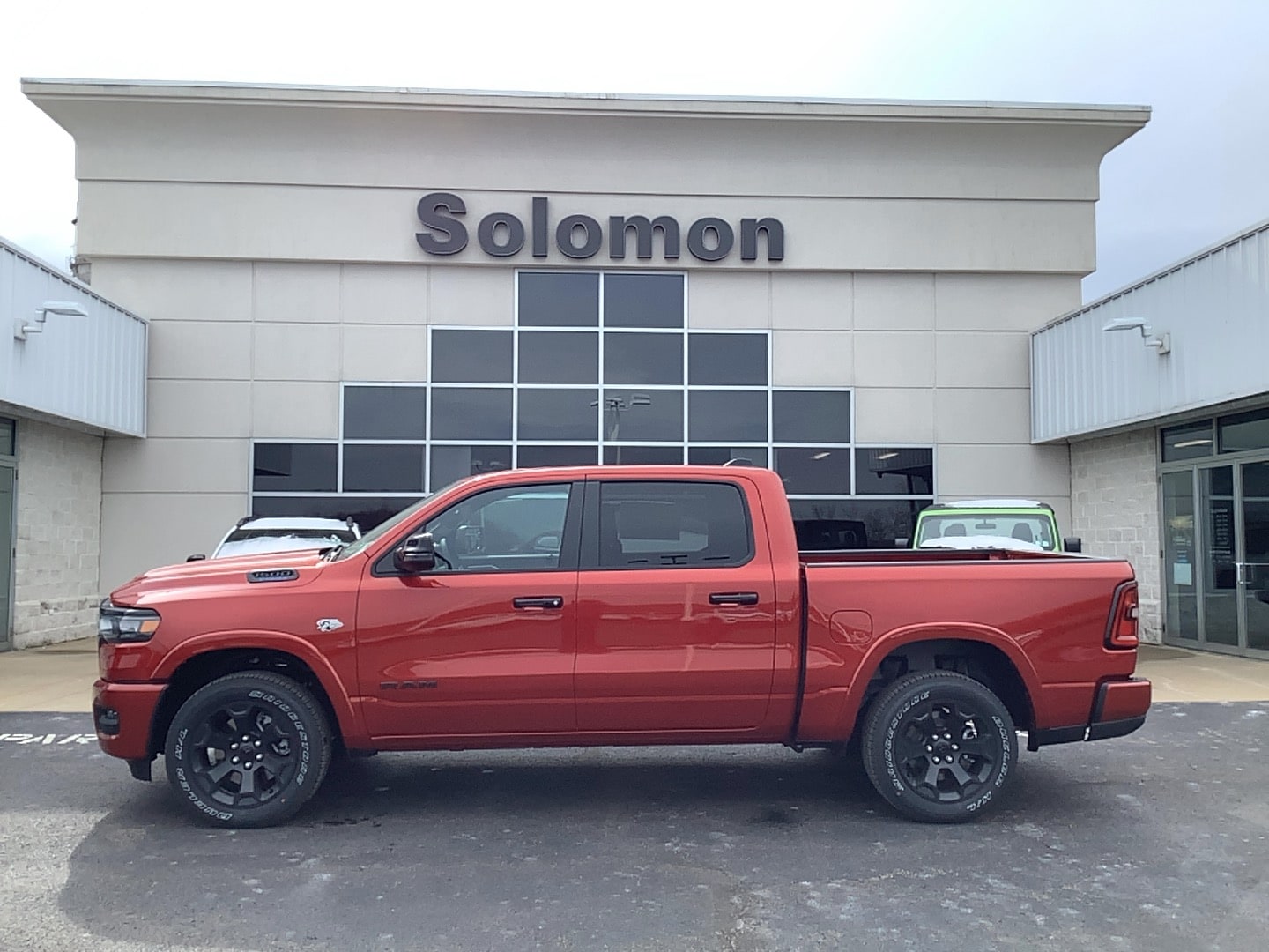 2026 Ram 1500 BIG HORN CREW CAB 4X4 5'7 BOX Molten Red Pearlcoat at Solomon CJD Carmichaels