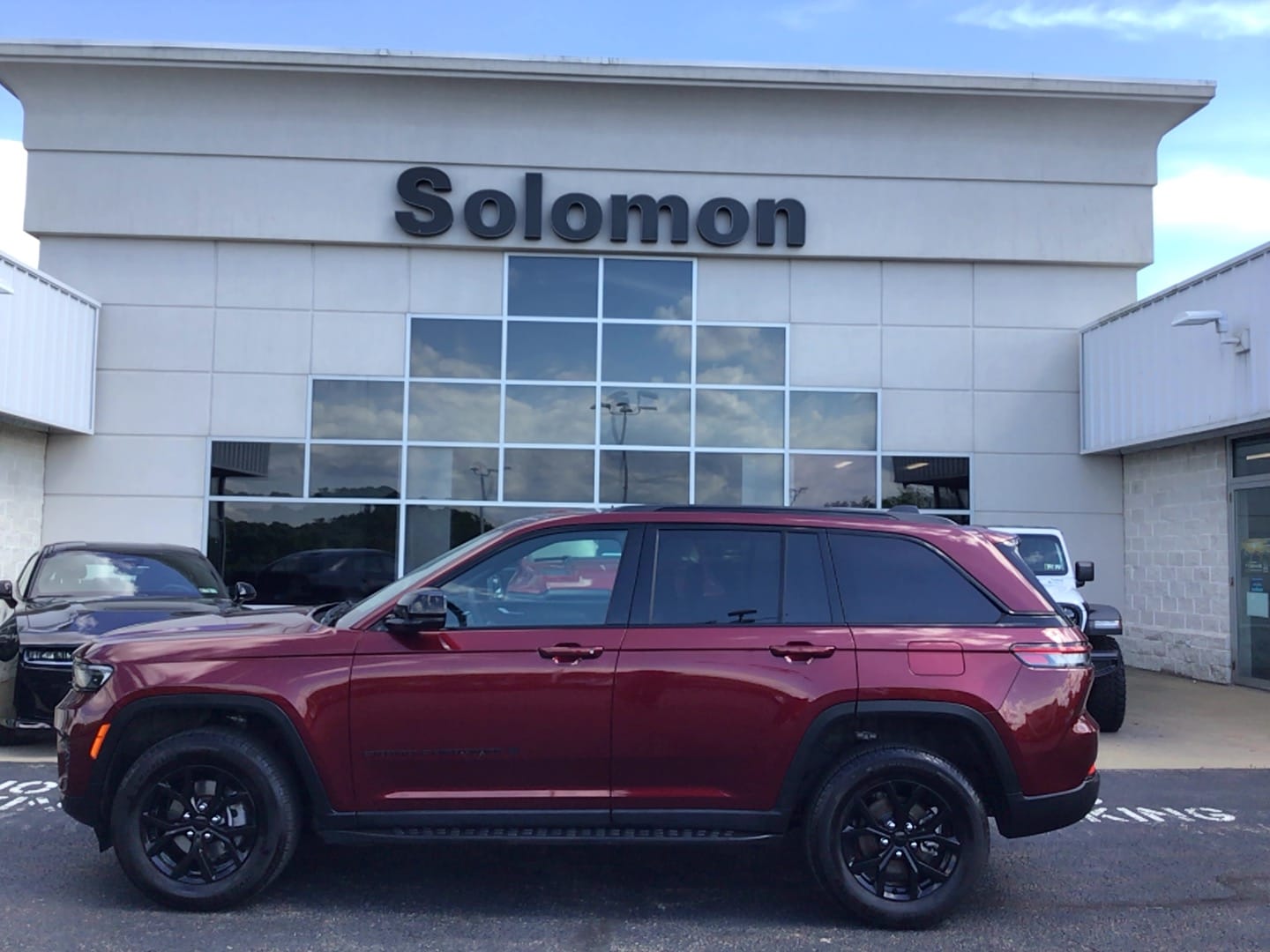 2025 Jeep Grand Cherokee Altitude X Velvet Red Pearlcoat at Solomon CJD Carmichaels