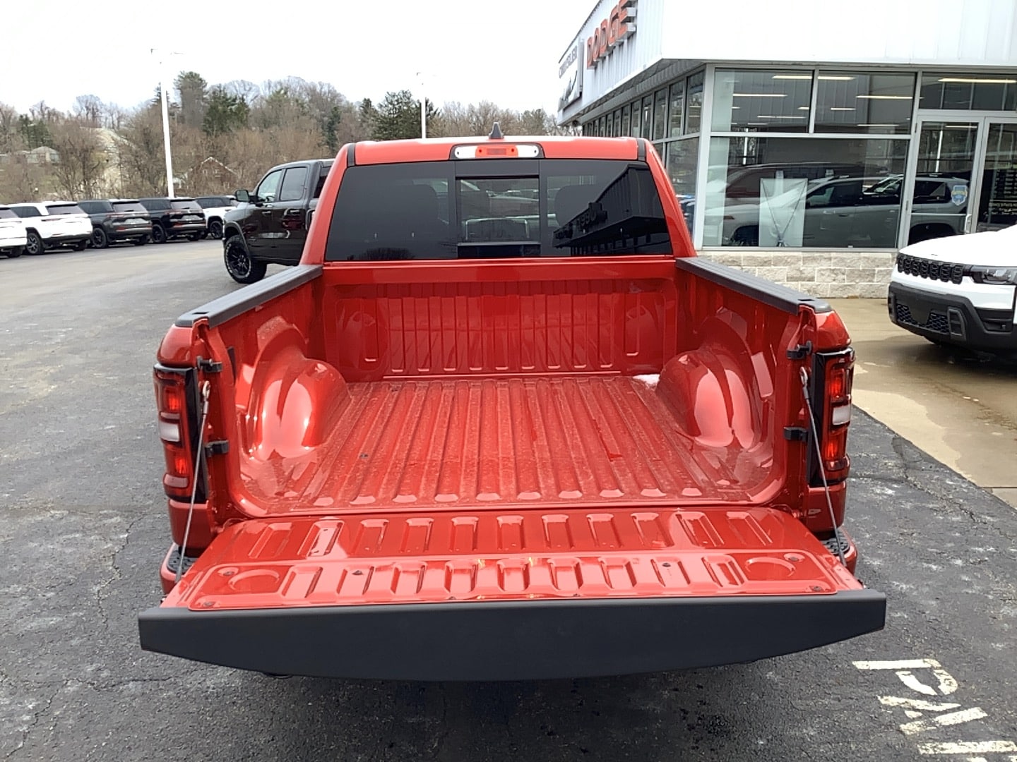 2026 Ram 1500 BIG HORN CREW CAB 4X4 5'7 BOX Molten Red Pearlcoat at Solomon CJD Carmichaels