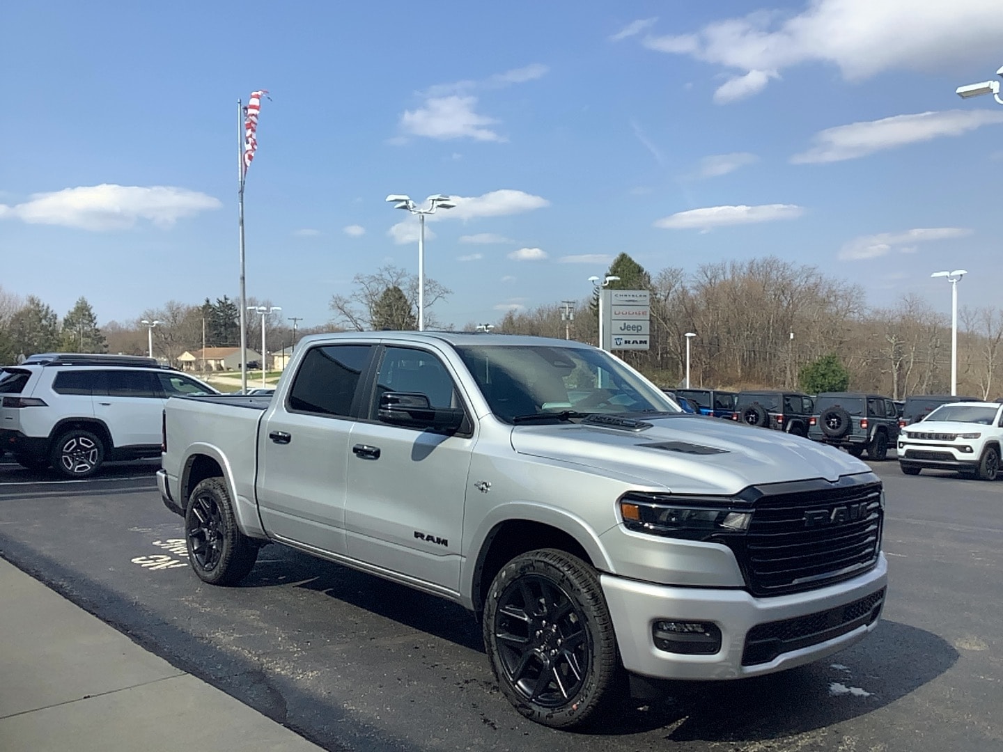 2026 Ram 1500 LARAMIE CREW CAB 4X4 5'7 BOX Silver Zynith at Solomon CJD Brownsville