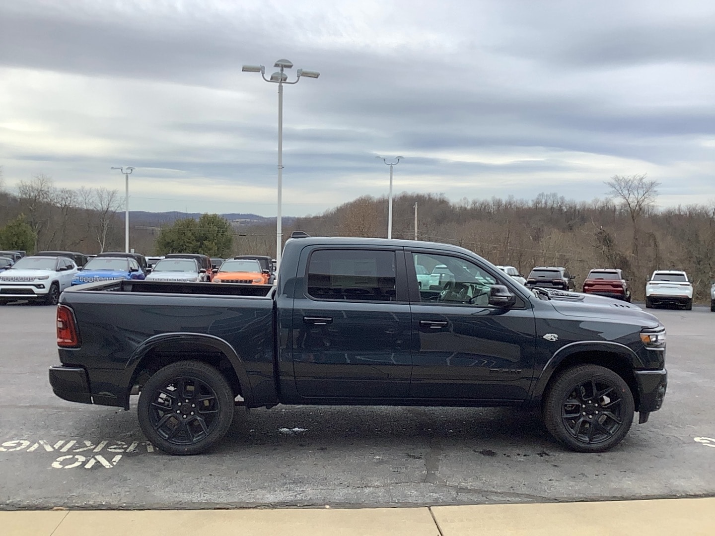 2026 Ram 1500 LARAMIE CREW CAB 4X4 5'7 BOX Forged Blue at Solomon CJD Carmichaels