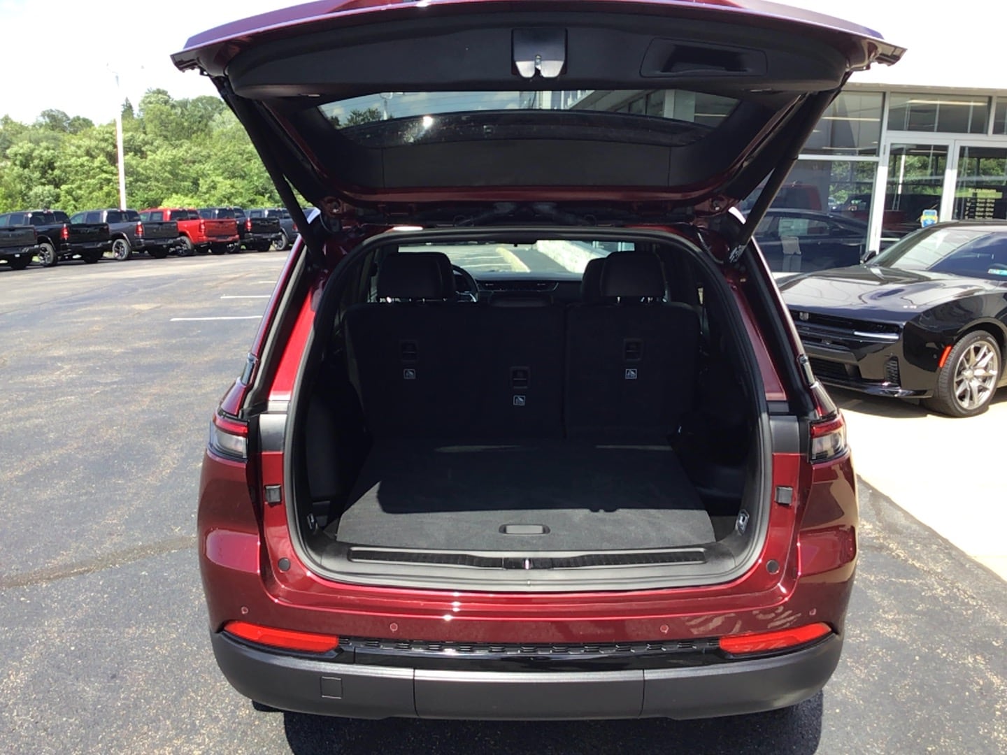 2025 Jeep Grand Cherokee Altitude X Velvet Red Pearlcoat at Solomon CJD Carmichaels