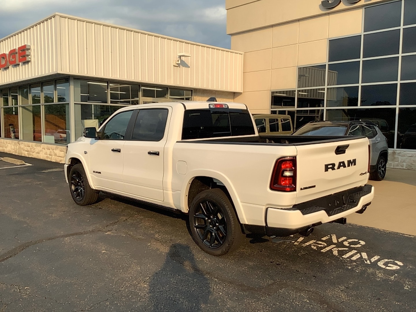 2026 Ram 1500 LARAMIE CREW CAB 4X4 5'7 BOX Bright White at Solomon CJD Brownsville