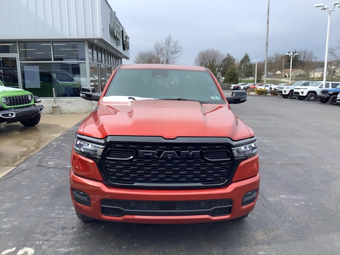 2026 Ram 1500 BIG HORN CREW CAB 4X4 5'7 BOX Molten Red Pearlcoat at Solomon CJD Carmichaels