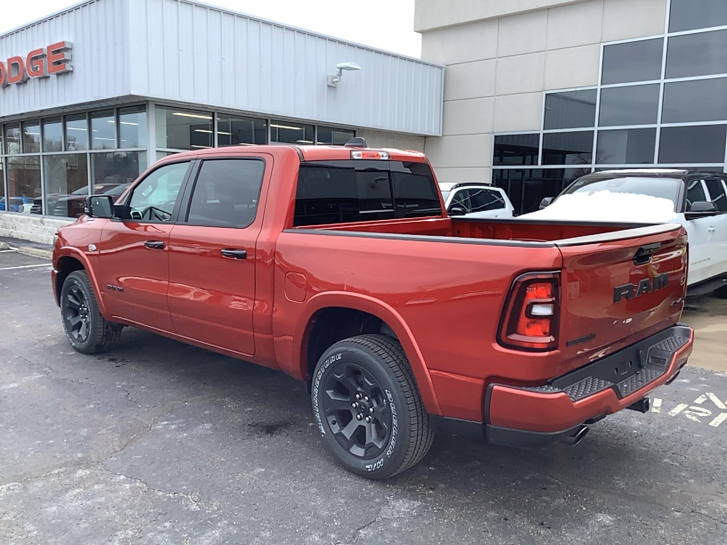 2026 Ram 1500 BIG HORN CREW CAB 4X4 5'7 BOX Molten Red Pearlcoat at Solomon CJD Carmichaels