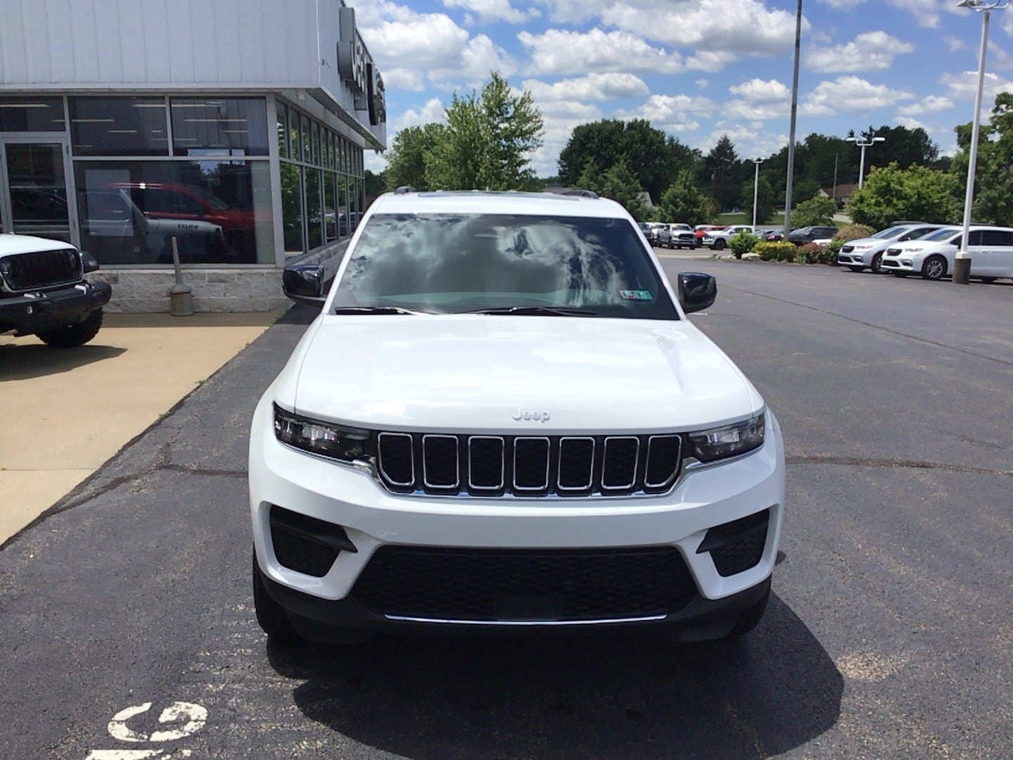2026 Jeep Grand Cherokee LAREDO X 4X4 Bright White at Three Rivers CJD