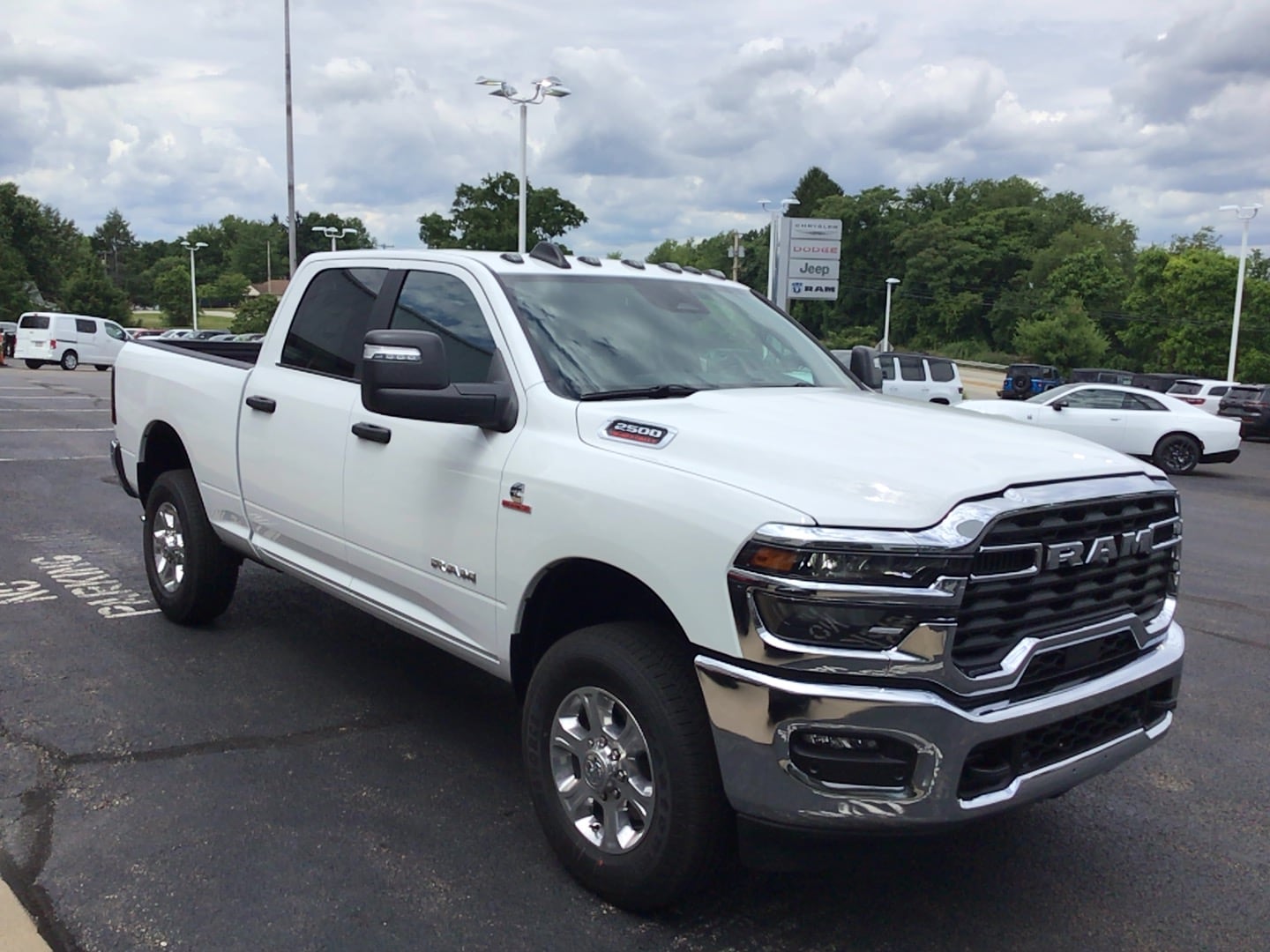 2026 Ram 2500 BIG HORN CREW CAB 4X4 6'4 BOX Bright White at Solomon CJD Brownsville