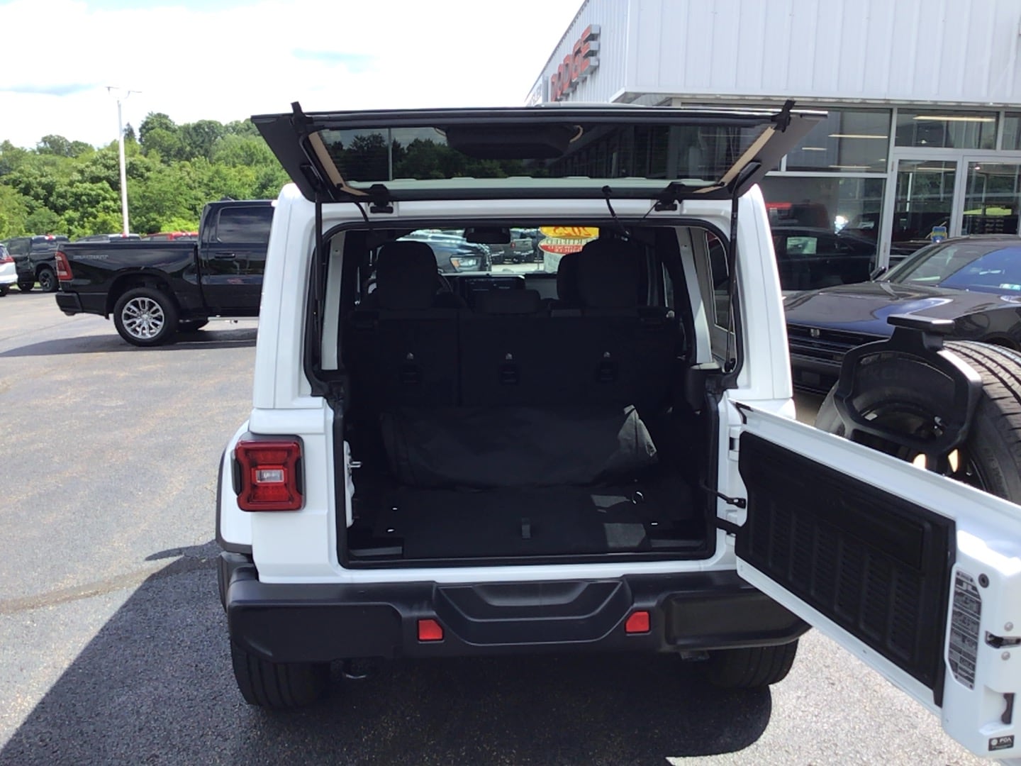 2025 Jeep Wrangler 4xe Sahara Bright White Clearcoat at Solomon CJD Brownsville
