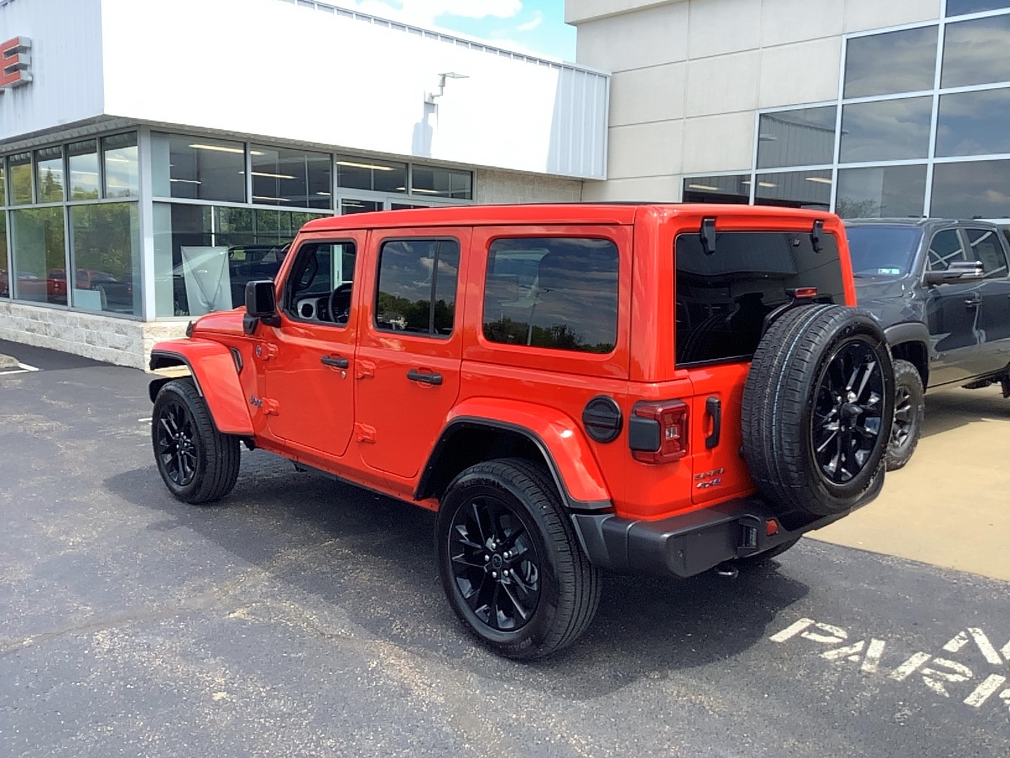 2025 Jeep Wrangler 4xe Sahara Firecracker Red Clearcoat at Solomon CJD Brownsville