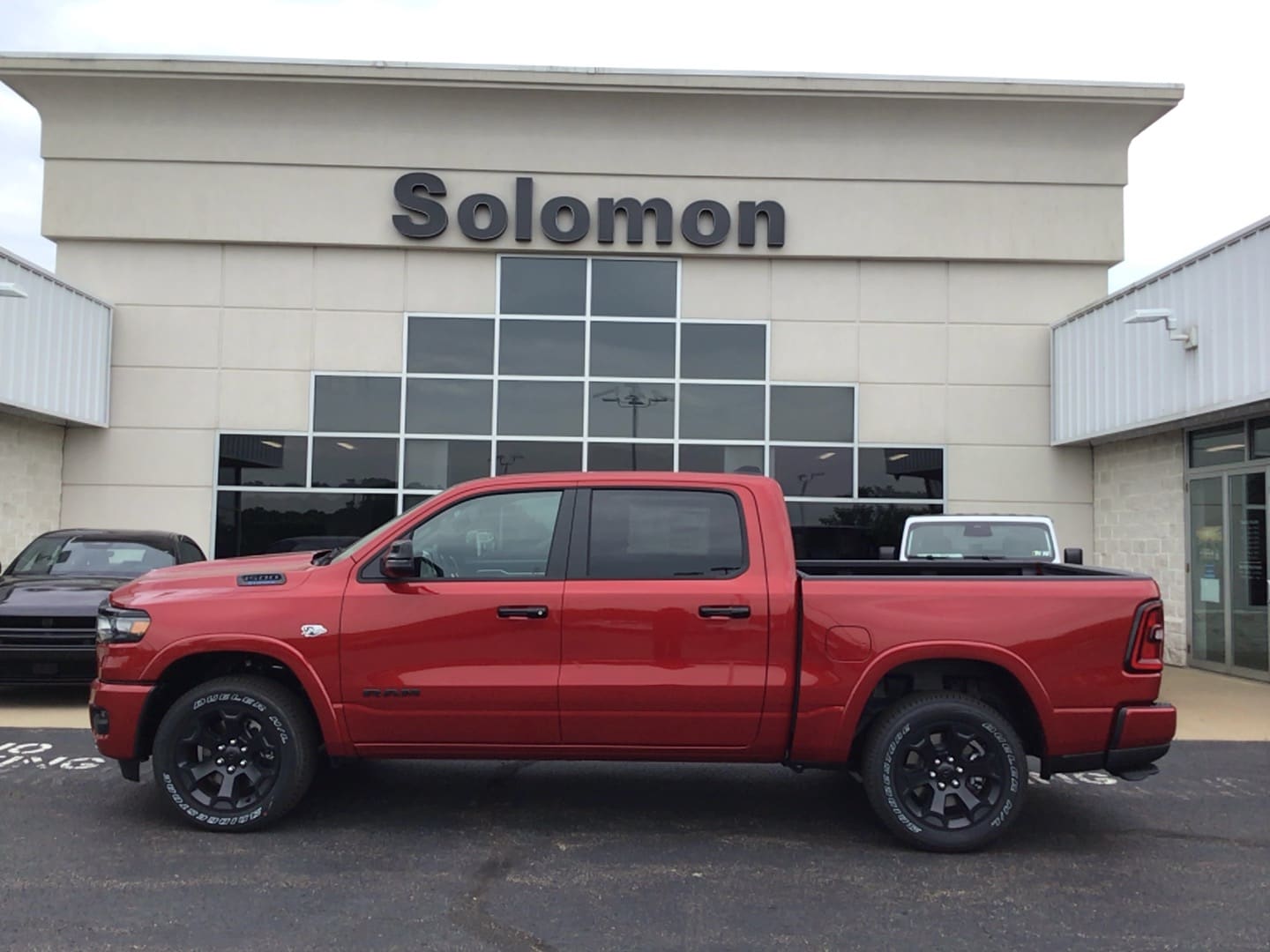 2026 Ram 1500 BIG HORN CREW CAB 4X4 5'7 BOX Molten Red Pearlcoat at Solomon CJD Carmichaels
