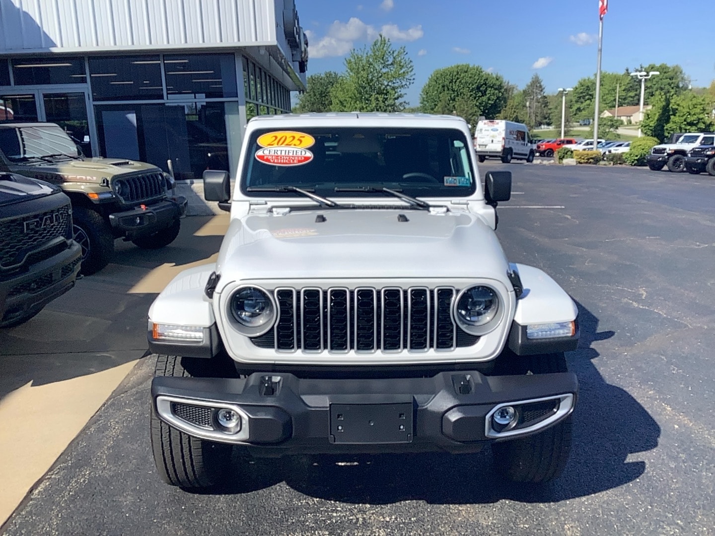 2025 Jeep Wrangler 4xe Sahara Bright White Clearcoat at Solomon CJD Brownsville