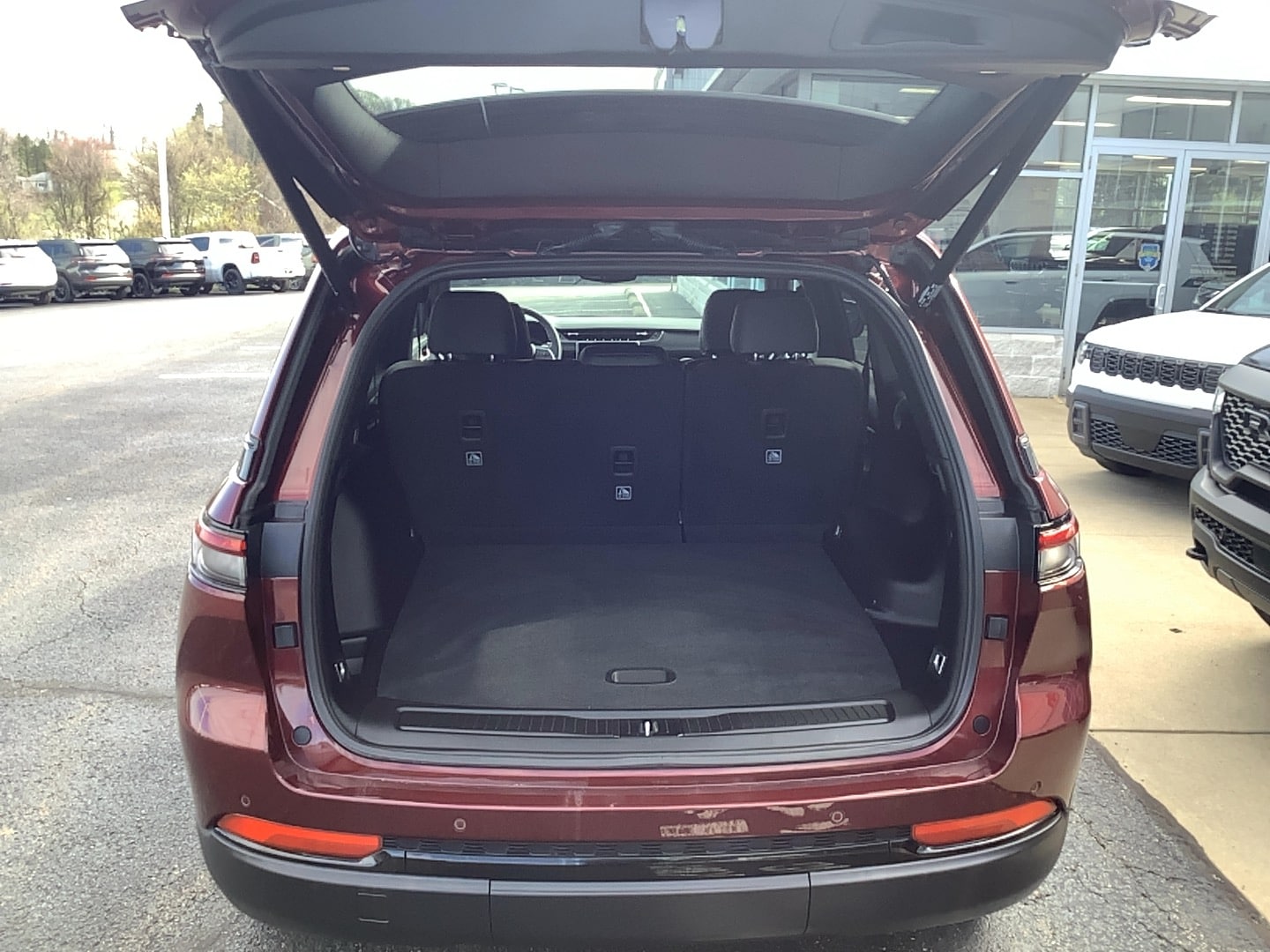 2024 Jeep Grand Cherokee Altitude Velvet Red Pearlcoat at Solomon CJD Carmichaels