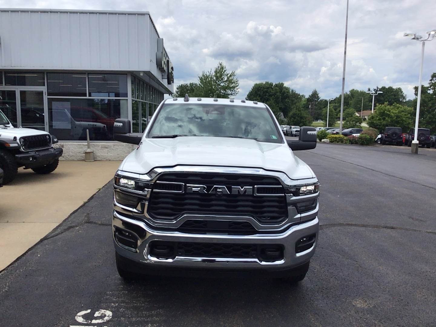 2026 Ram 2500 BIG HORN CREW CAB 4X4 6'4 BOX Bright White at Solomon CJD Brownsville